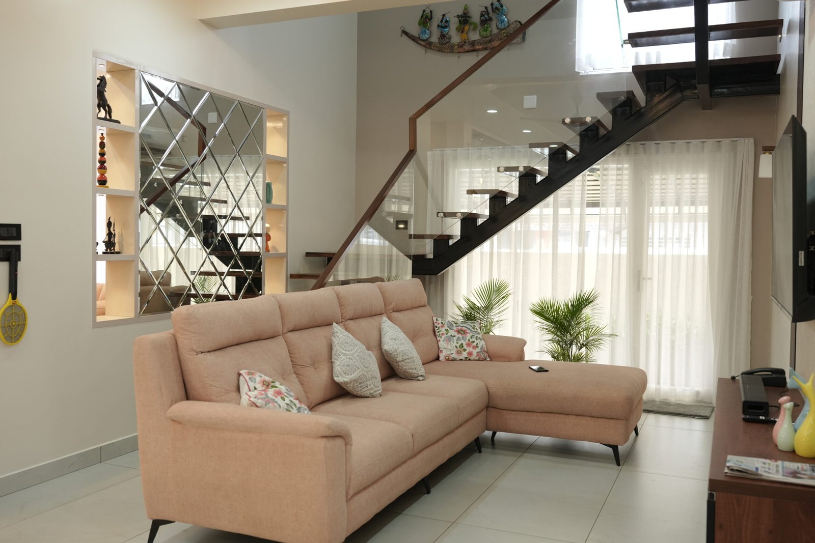 Bright living room with grey sofa and wooden coffee table